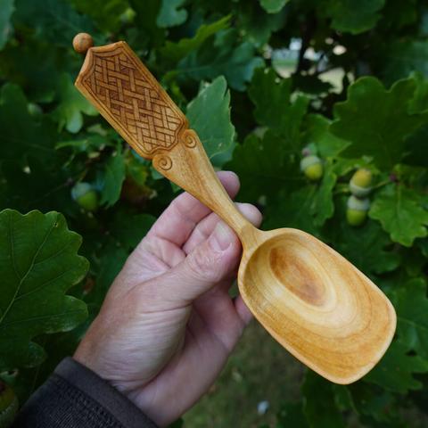 Wooden spoon held at an angle