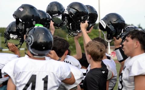 Football: Trojans low on bodies but high on potential