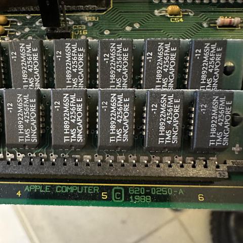 Closeup of the logicboard: RAM chips and APPLE COMPUTER 620-0250-A copyright 1988