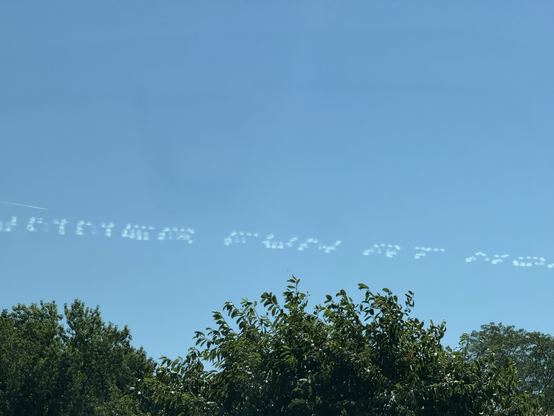 Skywriting on a blue sky