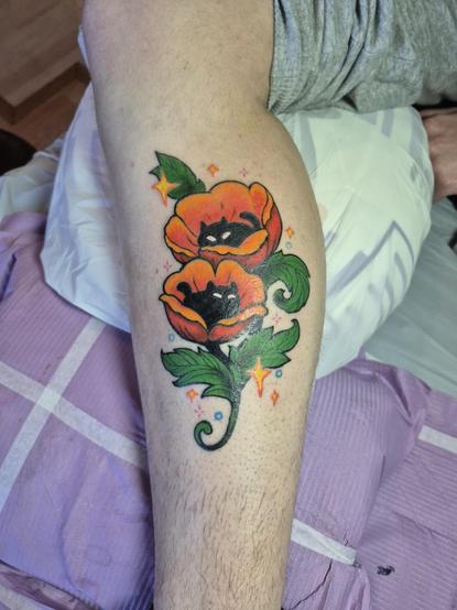 Another photo of the same but slightly further away to show the size of the tattoo on the leg.