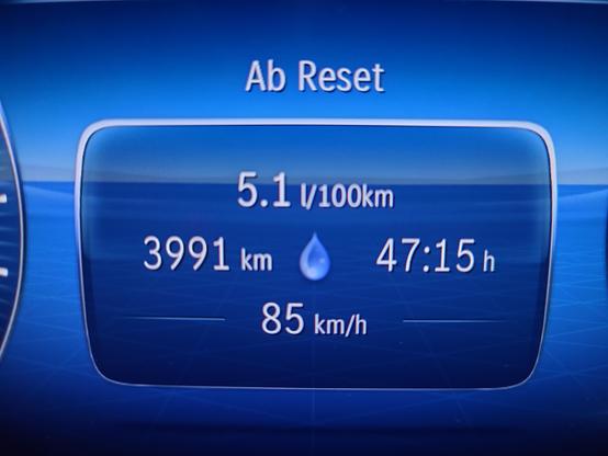 Picture of a car's board computer showing avarage gas consumption (5.1 l / 100 Km), distance (3991 Km), driving hours (47:15 h) and avarage speed (85 km/h) which I drove on my trip to Sweden within 9 days.