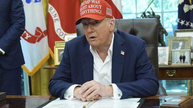 Trump says he'll be at Ryder Cup and he thinks captain Keegan Bradley should play