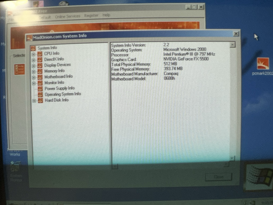 A screenshot of the MadOnion.com System Info window shows system specs for a Compaq PC running Windows 2000. The CPU is an Intel Pentium III at 797 MHz, with an NVIDIA GeForce FX 5500, 512MB of RAM, and motherboard model 0688h by Compaq. The tool version is 2.2.