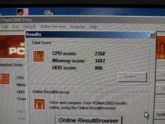 A screenshot of the PCMark2002 Free results screen shows a benchmark with an Intel Pentium III at 800MHz. The scores are: CPU – 2168, Memory – 1481, and HDD – 996.