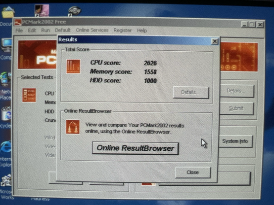 Another PCMark2002 Free results screen, now reflecting the upgraded CPU. The scores are improved: CPU – 2626, Memory – 1558, and HDD – 1000, indicating better performance from the 1GHz Pentium III.