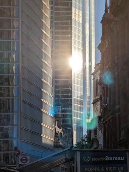 Sun reflecting on the glass of a skyscraper in the City of London.