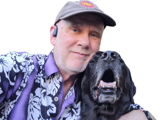 Selfie with my arm around my black lab Jet.