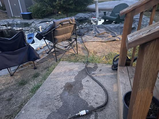 The hole sneaking along the ground towards the pond