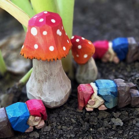 Sleeping Gnomes, clustered around a Mushroom