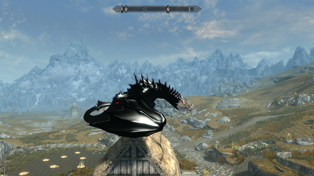 Modded Skyrim screenshot: The player - a dragon in a black latex catsuit perches on a house at Rorikstead.  The sun gleams off his brightly polished back and wings.  Off-shot, Silah the dragoness and Nahagliiv are checking the area for threats, having seized control of the area from the Whiterun guards, now recently deceased.  As long as Nahagliiv doesn't target civilians, this is considered an acceptable loss.

This was made with Play-As-A-Dragon SE and my own Catsuit Dragon 1.0 mod
