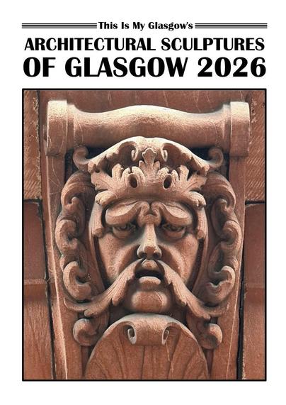 A carved stone head on the front of a 2026 calendar.