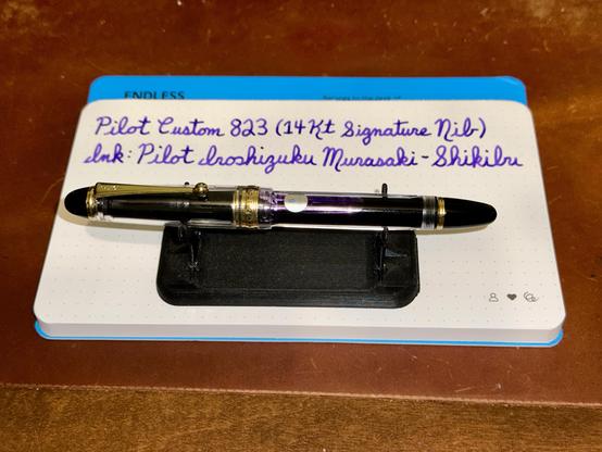 My third service anniversary celebration pen. 
A demonstrator Pilot Custom 823 filled with Pilot Iroshizuku Murasaki-Shikibu (Japanese Beautyberry) ink.