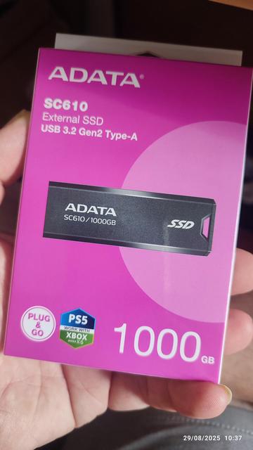 Pink box with a "USB thumb drive" sized ADATA SC610 USB 3.2 Gen2 SSD inside