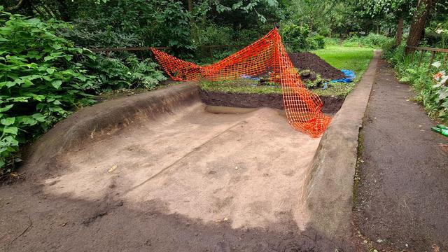 A partially excavated slalom course from a 1970s skate park in Glasgow which was later filled in.