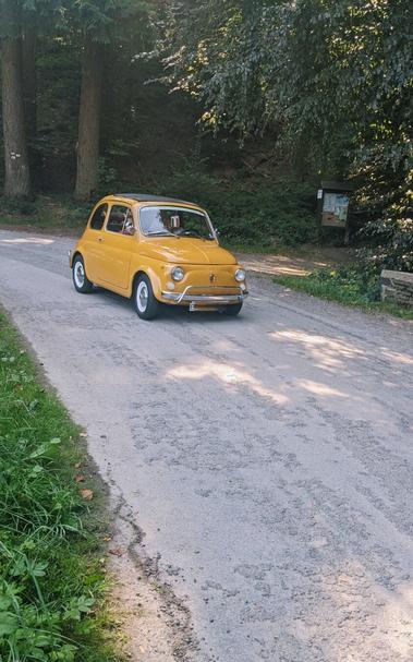 Yellow old Fiat car
