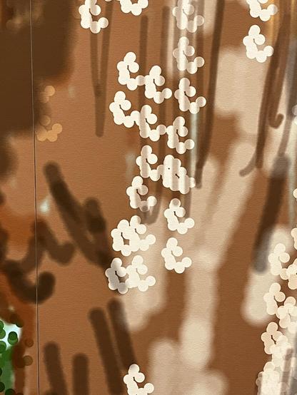 Pinselstempel aus 6 schneckenförmig angeordneten Punkten