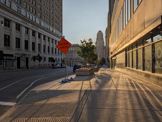 exterior urban sidewalk—sunset