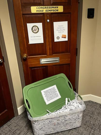 A tub of shredded slips in front of Rep. Simpson’s office