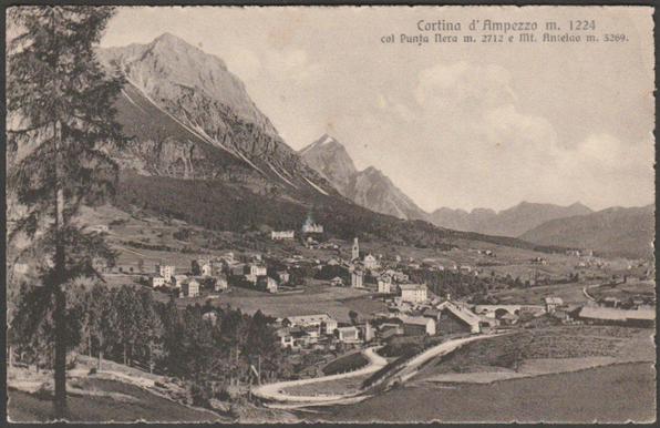 Printed sepia postcard showing a panoramic view of Cortina d'Ampezzo in Veneto, Italy.

Published by Lorenz Fränzl, Bolzano, No 304/30.

Postally used on 22 July 1949 with Passo di Pordoi, Trento cancellations on blue 5 lire and red 3 lire stamps and sent to Miss W. Cross, Lampton Hall, Hounslow, Middlesex, England.

Very good condition, with very slight corner bumps.