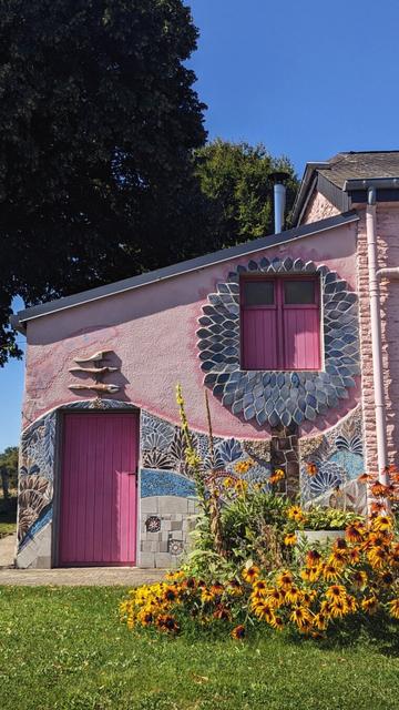 Pink façade and sun flowers