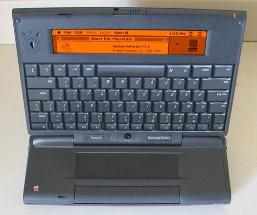 A photo of a Macintosh Horizontal Product. It looks like a PowerBook 190 that went through some kind of dimensional disassembler and reassembler. Nothing is where it should be and frankly it looks like it may attack.
