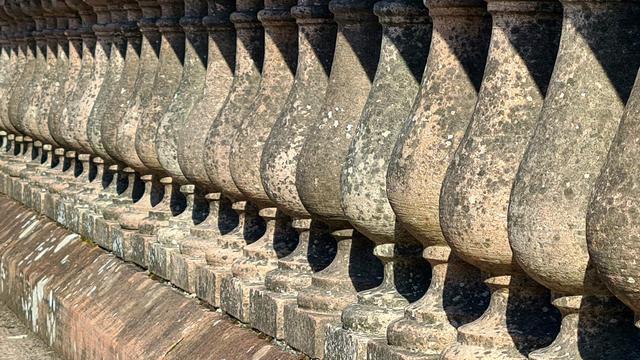 A repeating pattern created by the supports of the balustrade of a Victorian Bridge.