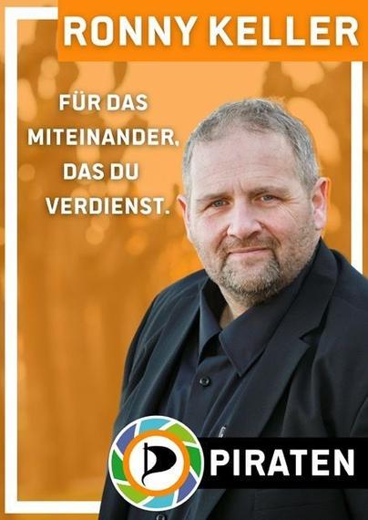 Bildtext: Ronny Keller. Für das Miteinander, das Du verdienst. Piraten.
Bild: Foto von Ronny Keller.
