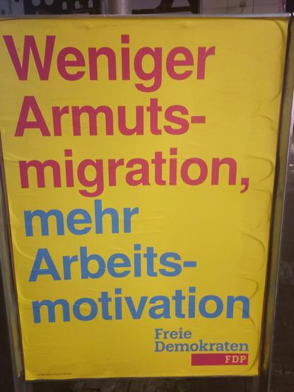Plakat in grellen FDP-Farben
"Weniger Armutsmigration, mehr Arbeitsmotivation"