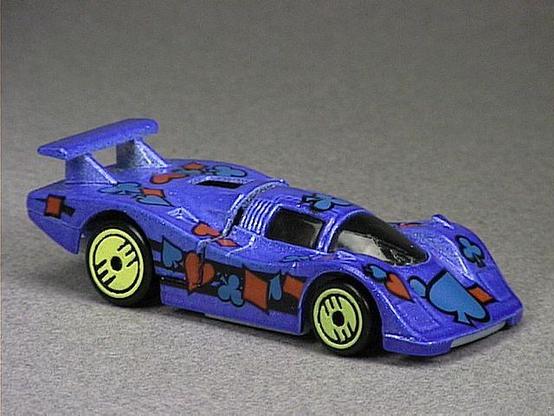 Released in 1993, Candy Blue Sol-Aire CX4 of Revealers with Ultra Hot wheels. Tampo: Red, black and blue playing card suits all over. Packaging: Revealers 10 Pack. Metal Body, Plastic Base. Made in Malaysia. Scarcity: 2/10