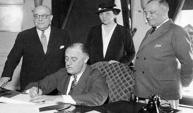 President Franklin Delano Roosevelt signs the Wagner Act, which created the NLRB, into law.