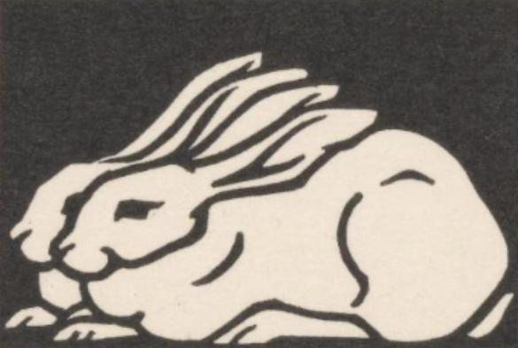 An illustration of two hares superimposed side by side, identical, with the back rabbit just slightly forward of front one. Against a dark gray colored background, the rabbits are a cream white color. They are drawn in thick dark lines, resembling the background color, broad strokes with not much detail. They are crouching down together.

The credits are: 

Twee konijnen
Julie de Graag, 1923 - 1924