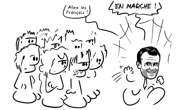 Une foule est rassemblée. Macron les appelle en disant : « Allez les Français ! EN MARCHE ! »