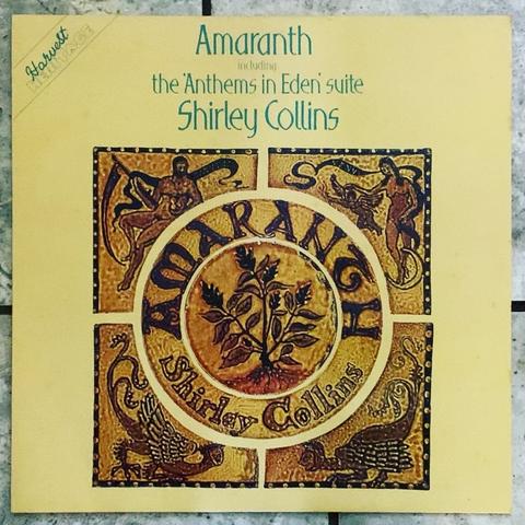 Amaranth by Shirley Collins, released on Harvest in 1976.

Anthems in Eden is a 1969 album by Shirley and Dolly Collins,[1] with the Early Music Consort of London, directed by David Munrow. The album originally consisted of a 28-minute set of folk songs plus seven other individual pieces performed by the same group. The musical arrangements for these eight pieces included early music instruments, such as viols, recorders, sackbuts and crumhorns. In 1976, six new songs were recorded with a different assortment of accompanists, to replace the original seven individual songs. This 1976 album consisting of the 28-minute set plus the six new songs was released by Harvest Records under the title Amaranth. - Wikipedia