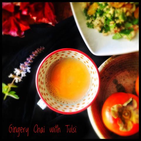 A cup of chai made with ginger and tulsi.
