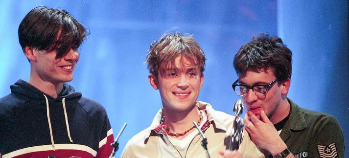 Alex James, Damon Albarn y Graham Coxon, Blur, en los Brit Awards 1995. / JMEnternational