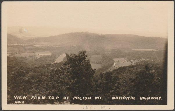 Monochrome real photographic postcard showing a view from the top of Polish Mountain on the National Highway near Flintstone in Maryland, USA .

Publisher not stated, No 4, AZO stamp box, c.1925.

Postally unused.

Very good condition, with slight corner bumps, but small light mark to top left.
