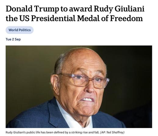 The news headline reporting the awarding of Giuliani with the Medal of Freedom.