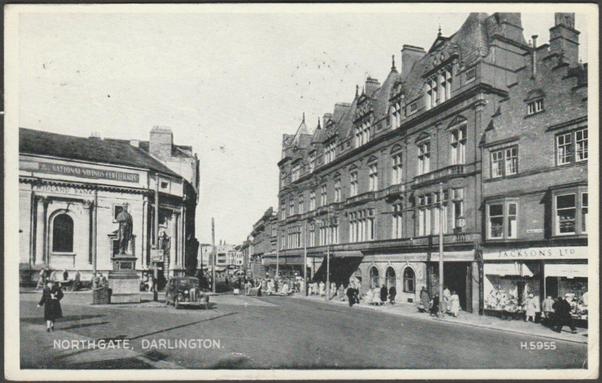 Printed monochrome postcard showing a view of Northgate at Darlington in County Durham.

Published by Valentine & Soms Ltd, Dundee & London, Silveresque, No H.5955, photo registered in 1948.

Postally used on 27 June 1956 with Darlington cancellation on brown 2d stamp and sent to Mrs Faulkner, 9 The White City, Midhurst, Sussex.

Good condition, with slight corner bumps, but slight knock to left centre of bottom edge with small 3mm tear.