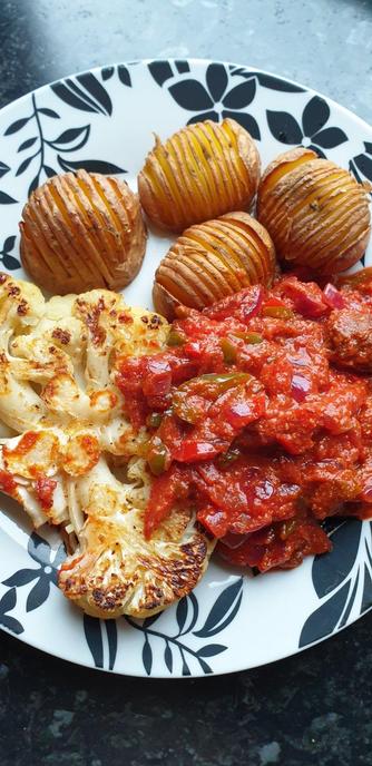 Cauliflower Steak, Hasselbach Potatoes, Vegobollar 'meat' balls in smoked paprika & tomato sauce.