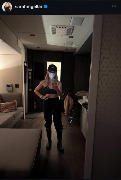 An IG post by Sarah Michelle Gellar, posted yesterday. This pic was included in a carousel with pics from the last 3 weeks. She is taking a selfie in front of a mirror while wearing a white KN95 mask. She is on set of “Buffy the Vampire Slayer: New Sunnydale”.
