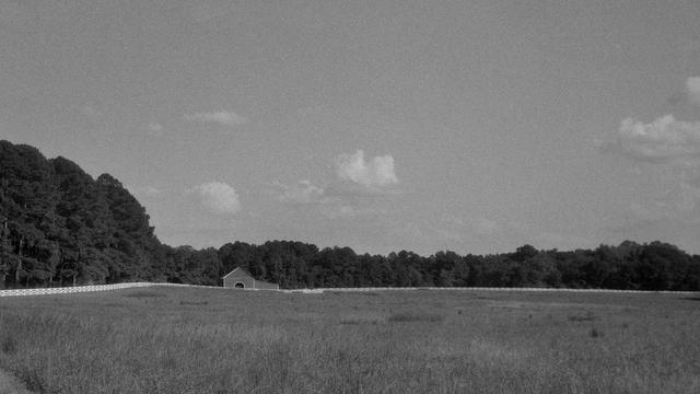 A barn across a large open field, surrounded by fence and trees in the background 

Mamiya 6 IV | Kentmere 200

Home developed in Rodinal 1+25 | 8:30 @ 22 C | Rotation