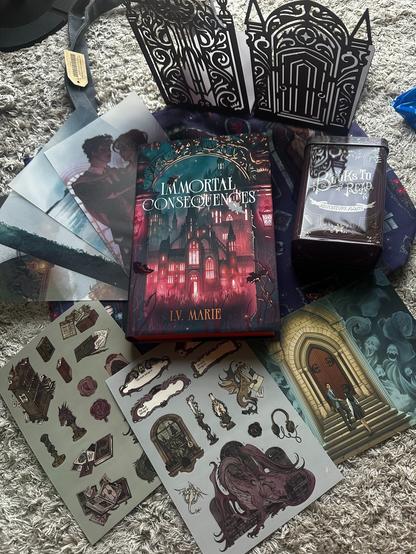 Das Buch Immortal Consequences von I.V. Marie plus Merch