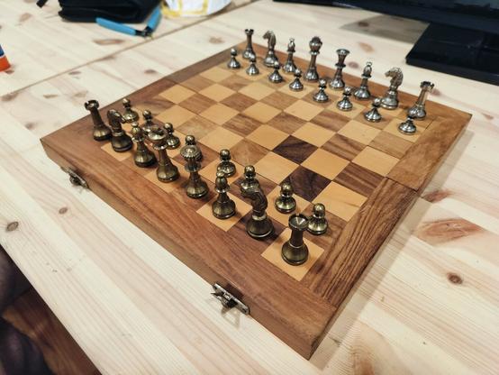 A wooden board with metal pieces