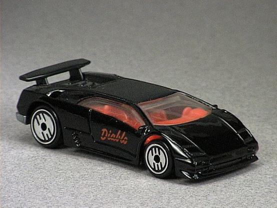 Released in 1993, Black Lamborghini Diablo of Exotic Car 5 Pack with Ultra Hot wheels. Notes: Never released in single blister. Tampo: DIABLO in red on sides; black plastic rear valance and wing. Packaging: 5 Pack. Metal Body, Metal Base. Made in Malaysia. Scarcity: 2/10