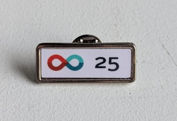 a rectangular pin with number 25 and the logo of Canadian Blood Services