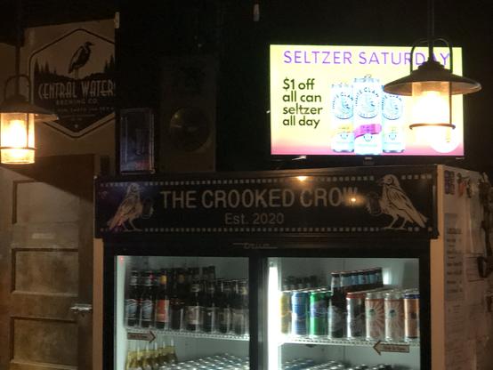Their sign inside above cooler/fridge