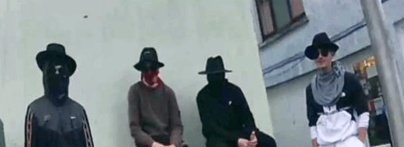 Crimestoppers Wales is offering a £1,000 reward for information that could help identify four men police want to speak to following a burglary in Carmarthen.
