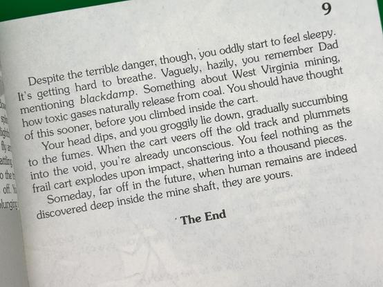 An open book page featuring text that describes a dangerous scenario involving toxic gases and a cart in a mine. The narrative conveys feelings of sleepiness and impending doom, concluding with the phrase "The End."