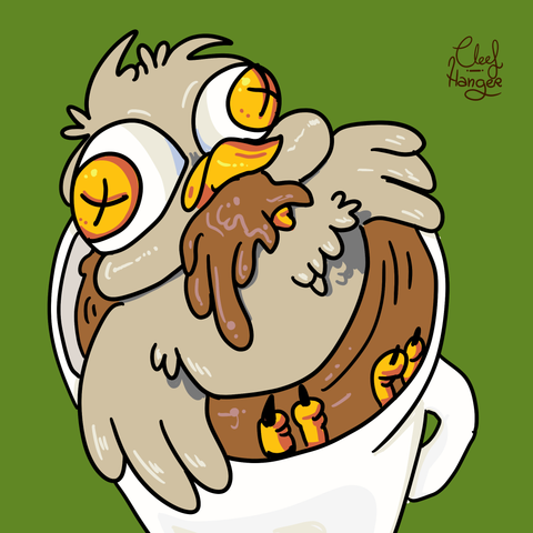 Un buho chiquito gris metido en una taza de chocolate con leche. De la boca le borbotea el chocolate , los ojos los tiene Ko, los piecitos le salen por un lado de la taza blanca.